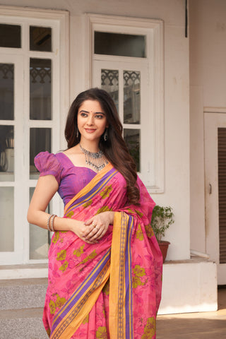 Kanchi Cotton saree in bright pink color with floral print.