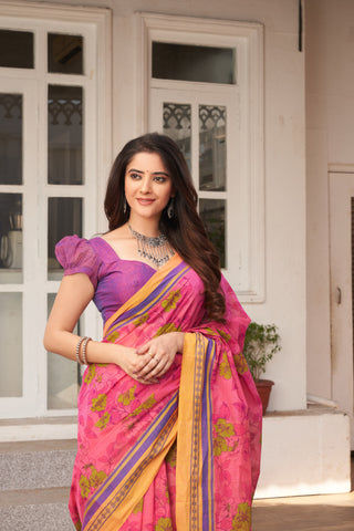 Kanchi Cotton saree in bright pink color with floral print.