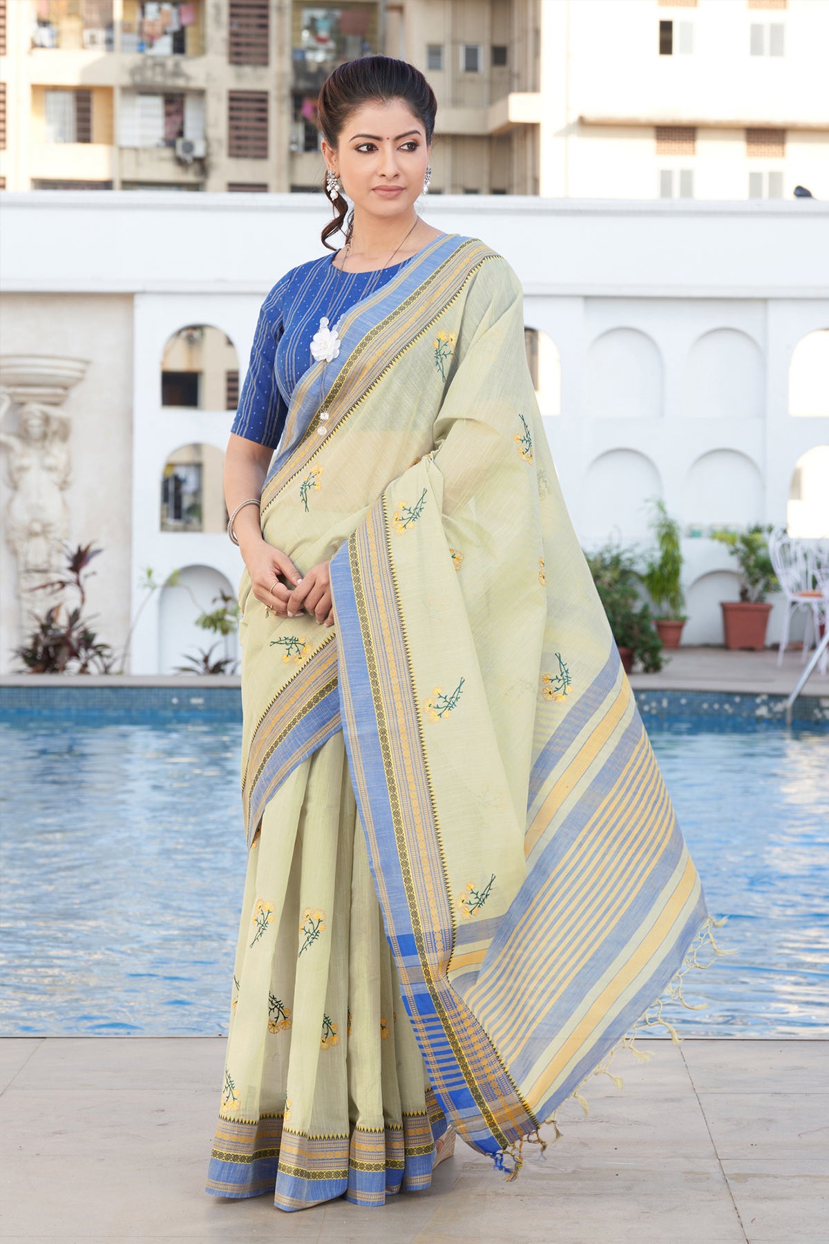 Chettinadu cotton saree in Bone mist with flower design hand embroidered.