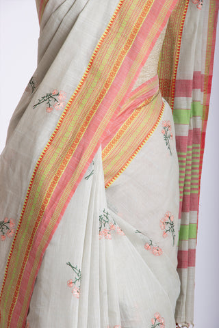 Chettinadu cotton saree in Bone mist with flower design hand embroidered.