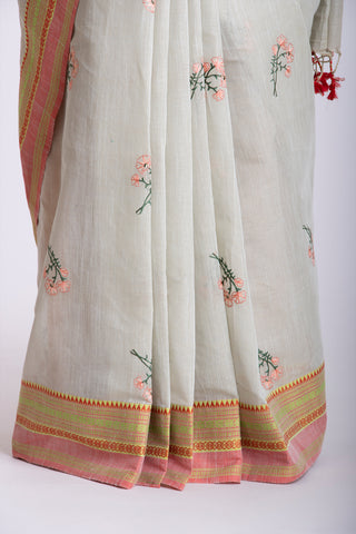 Chettinadu cotton saree in Bone mist with flower design hand embroidered.