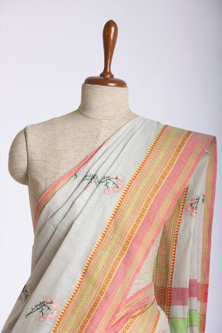 Chettinadu cotton saree in Bone mist with flower design hand embroidered.