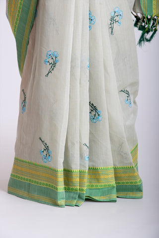 Chettinadu cotton saree in Bone mist with flower design hand embroidered.