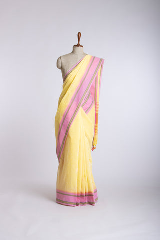 Chettinadu cotton saree  with yellow color branches and pink color flower hand embroidery.