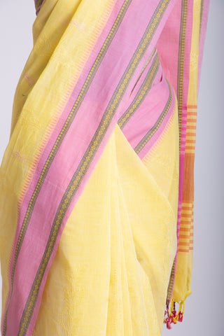 Chettinadu cotton saree  with yellow color branches and pink color flower hand embroidery.