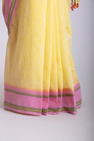 Chettinadu cotton saree  with yellow color branches and pink color flower hand embroidery.