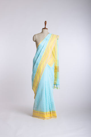 Chettinadu cotton saree  with yellow color branches and pink color flower hand embroidery.