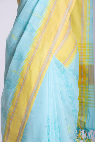 Chettinadu cotton saree  with yellow color branches and pink color flower hand embroidery.