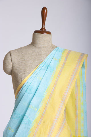 Chettinadu cotton saree  with yellow color branches and pink color flower hand embroidery.