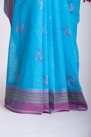 Kanchi cotton saree with Blue color branches  and pink color flower hand embroidery.