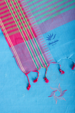 Kanchi cotton saree with Blue color branches  and pink color flower hand embroidery.