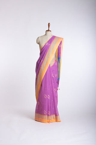 Kanchi cotton saree with Blue color branches  and pink color flower hand embroidery.