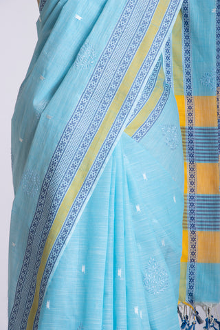 Kanchi cotton saree with Blue color branches  and pink color flower hand embroidery.