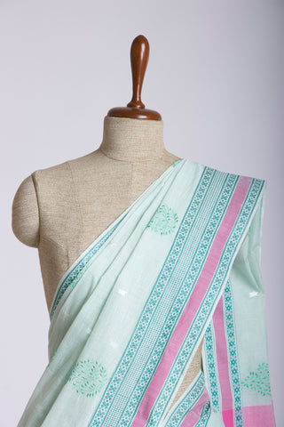 Kanchi cotton saree with Blue color branches  and pink color flower hand embroidery.