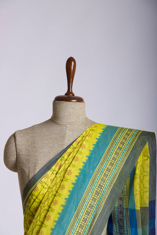 Chettinadu cotton saree in Yellow with floral print in the body