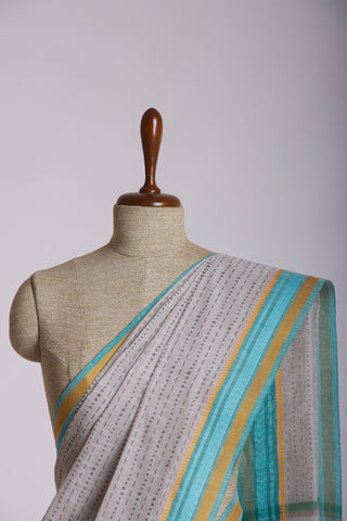 Kanchi cotton saree in dots and small lines print with texture