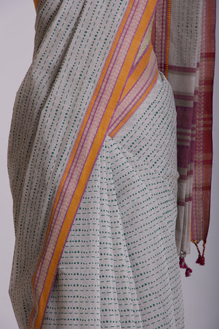 Kanchi cotton saree in dots and small lines print with texture