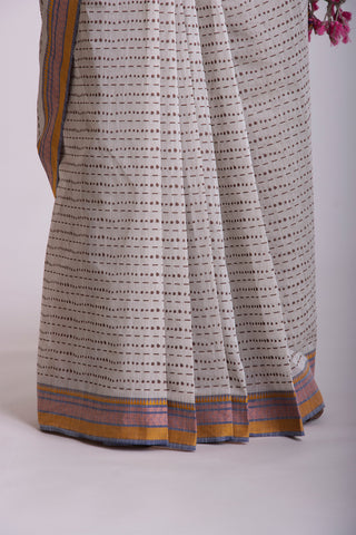 Kanchi cotton saree in dots and small lines print with texture