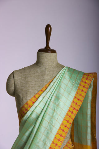 Mangalagiri Silk Sarees With All Over Checks And Printed Border.