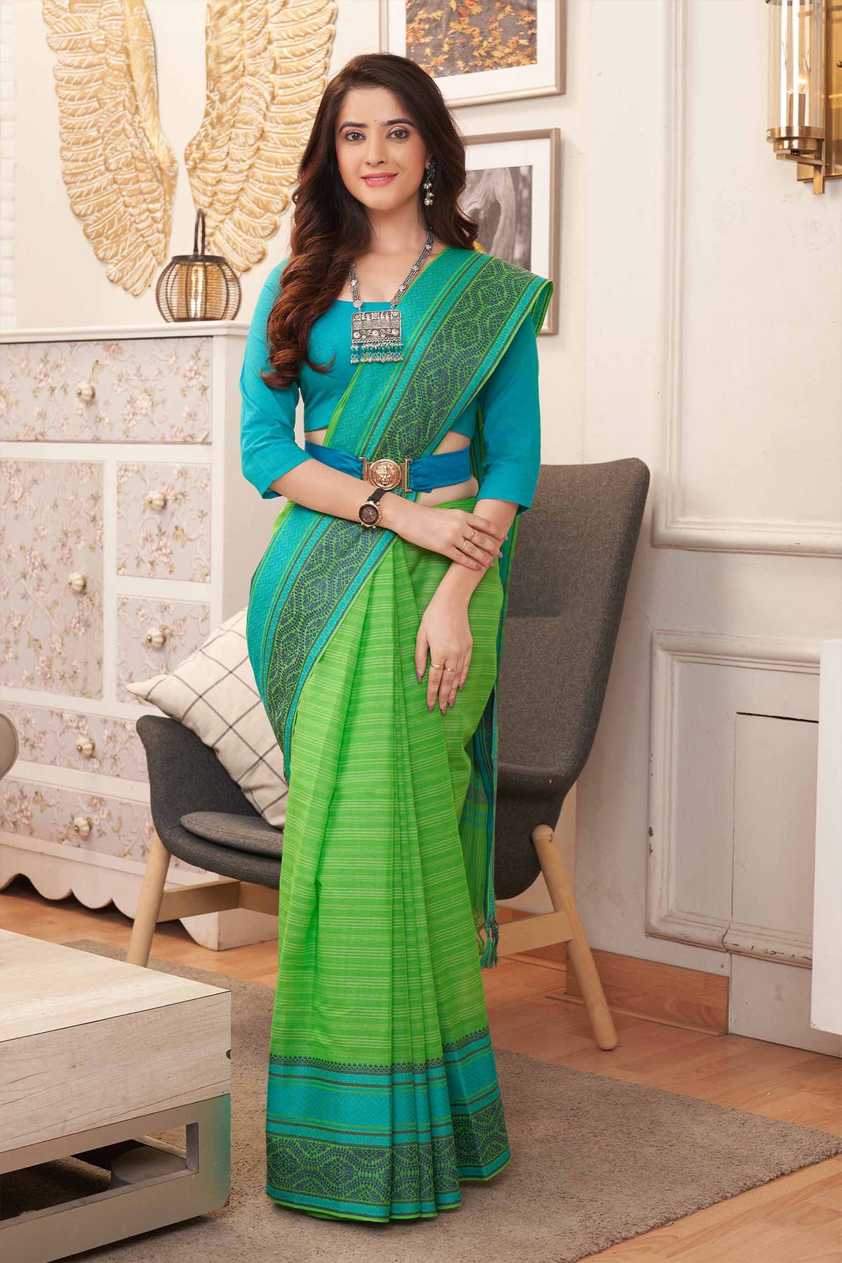 Chirala Cotton saree with weave border In Green With Sky blue Slub Texture.