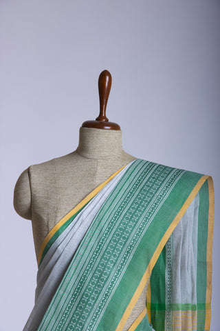 Chettinadu cotton saree in Cyan Blue with Soft Amber.