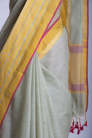 Chettinadu cotton saree in Cyan Blue with Soft Amber.