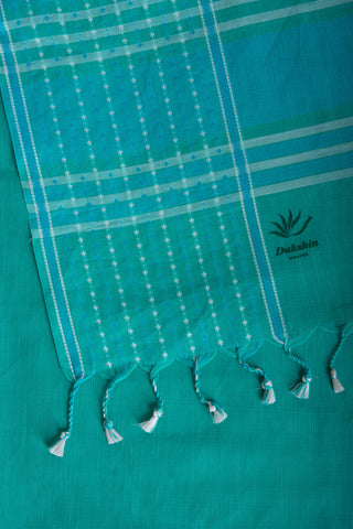 Chettinadu Cotton Saree In Sea Green With Soft Amber.