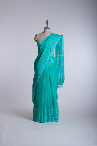 Chettinadu Cotton Saree In Sea Green With Soft Amber.