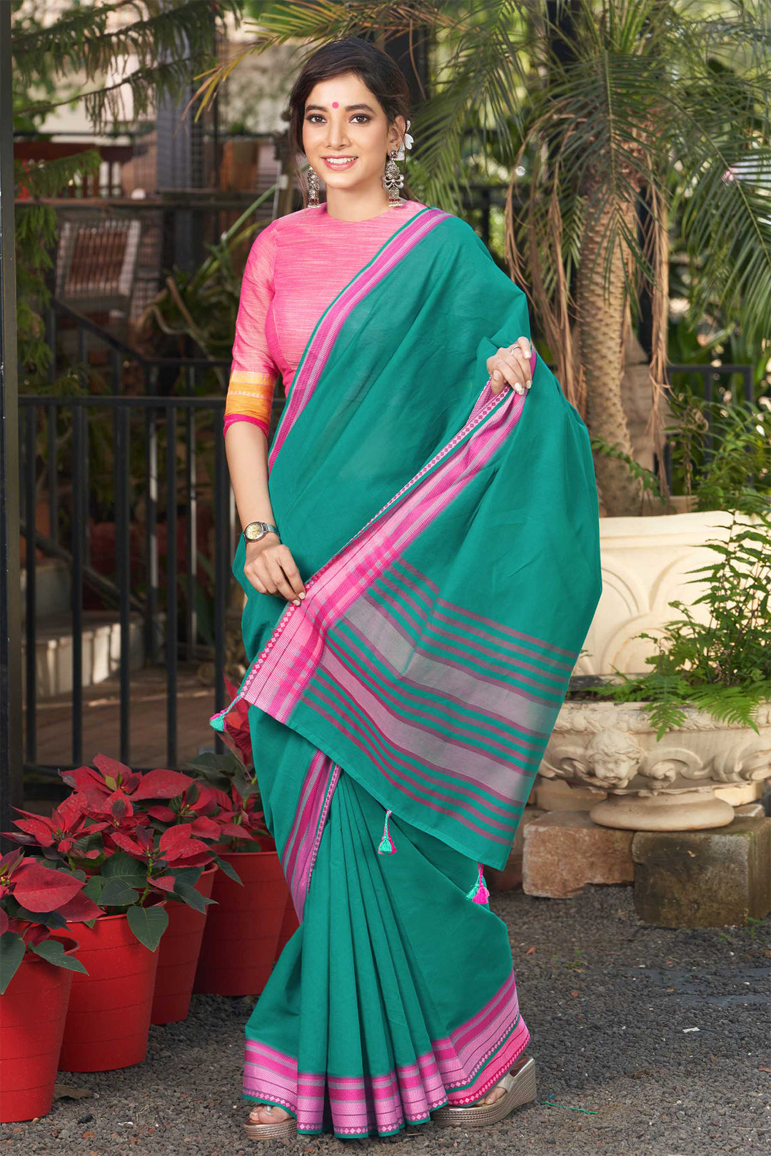 Deep green plain kanchi cotton saree, contrast traditional design border &  pallu of stripe designs