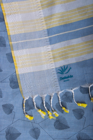 Pale yellow mangalagiri cotton saree with leaves handprint.