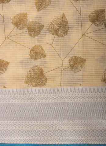 Pale yellow mangalagiri cotton saree with leaves handprint.