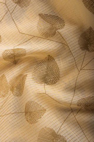 Pale yellow mangalagiri cotton saree with leaves handprint.