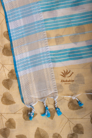 Pale yellow mangalagiri cotton saree with leaves handprint.