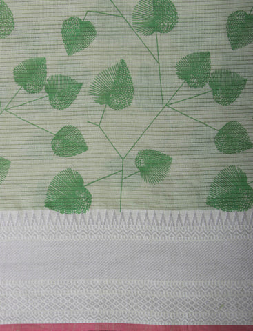 Pale yellow mangalagiri cotton saree with leaves handprint.