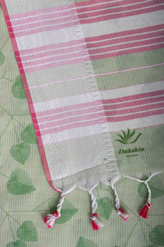 Pale yellow mangalagiri cotton saree with leaves handprint.