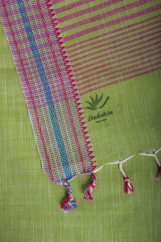 Alikam Khadi Cotton saree  in lime green with white slub texture.