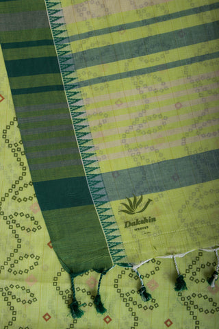 Kollam Cotton saree with lime green hand printed with Bandhani patterned design.