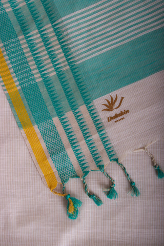 Kanchi Cotton saree  in pale yellow  with simple plain texture.