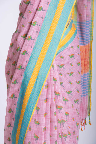 Blush pink ikkat cotton saree with flamingo motifs hand printed.