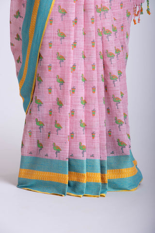 Blush pink ikkat cotton saree with flamingo motifs hand printed.