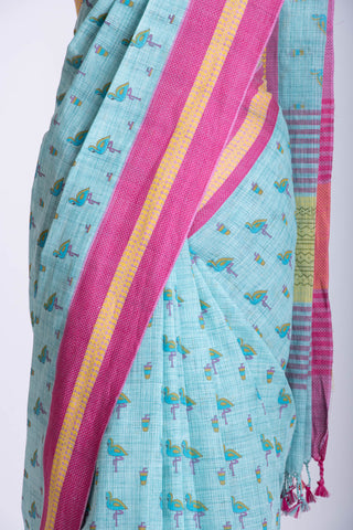 Blush pink ikkat cotton saree with flamingo motifs hand printed.