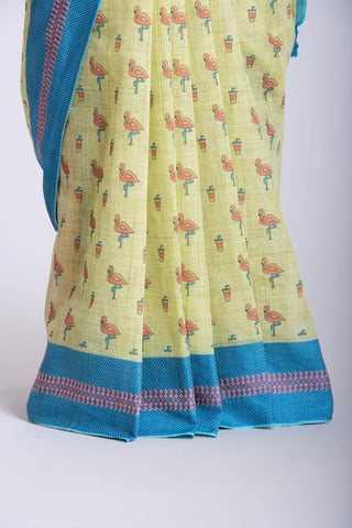 Blush pink ikkat cotton saree with flamingo motifs hand printed.