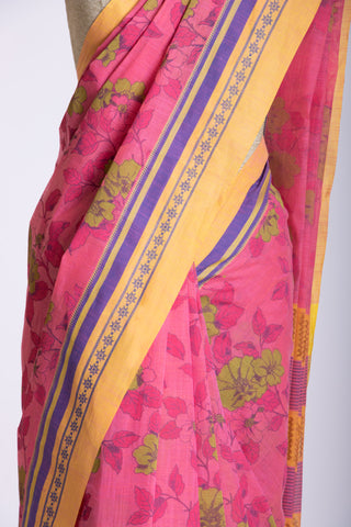 Kanchi Cotton saree in bright pink color with floral print.