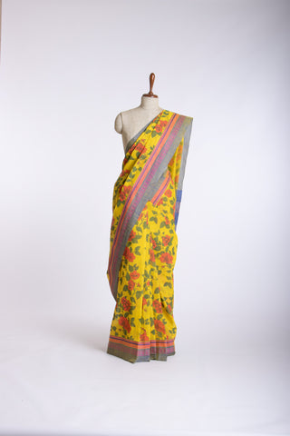 Kanchi Cotton saree in bright pink color with floral print.