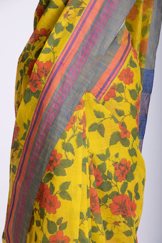 Kanchi Cotton saree in bright pink color with floral print.