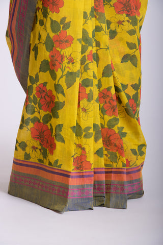 Kanchi Cotton saree in bright pink color with floral print.