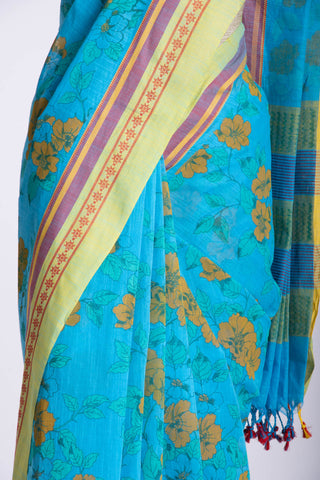 Kanchi Cotton saree in bright pink color with floral print.