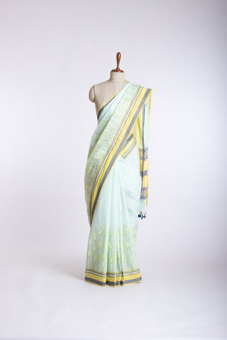 Alikam Khadi cotton saree in baby blue with lotus buds design hand embroidered.