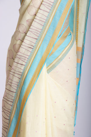 Alikam Khadi cotton saree in baby blue with lotus buds design hand embroidered.