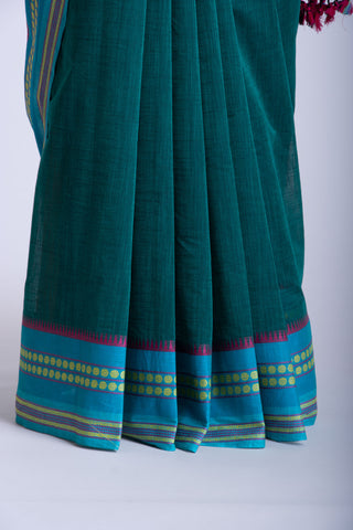 Alikam Khadi cotton plain saree in Midnight Green slub textured weave.